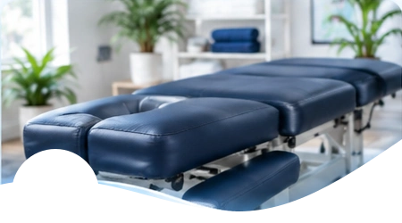 Padded decompression and traction treatment table.